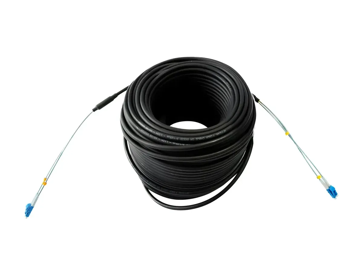 Pre-terminated FTTA jumper cable coiled with duplex LC connectors on both ends, a factory-sealed assembly for tower runs