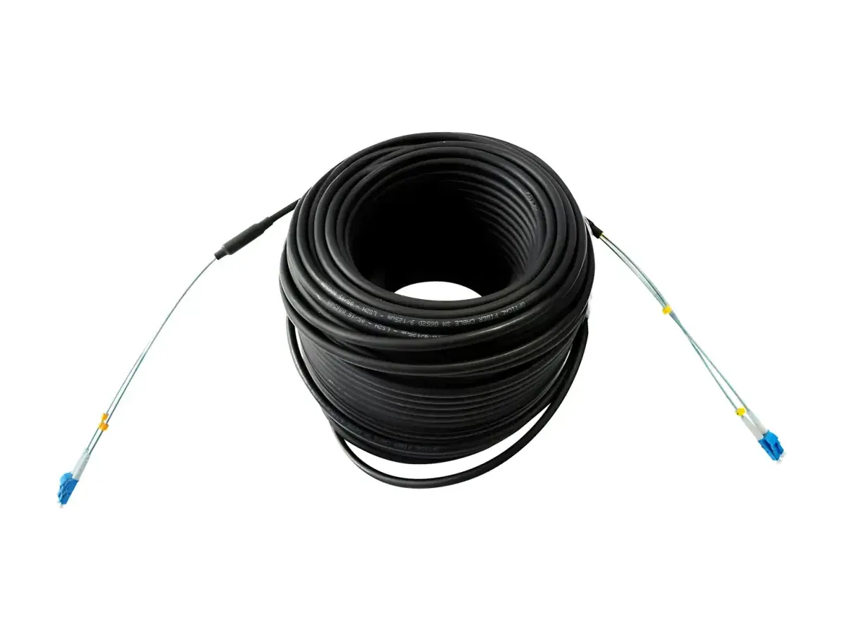 A coiled outdoor CPRI LC duplex fiber jumper with blue connectors, the typical fronthaul cable between the DU and a remote radio unit